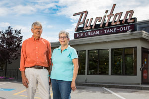 photo of Arthur Pappas and his sister in front of the Puritan